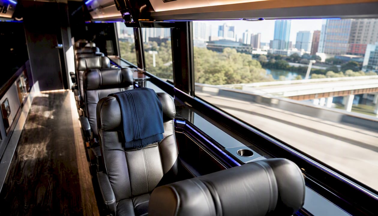 Empty luxury motorcoach interior with reclining seats