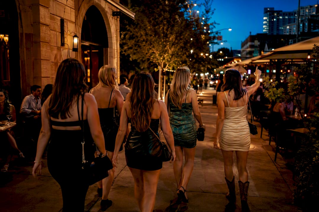 Friends beginning an Austin nightlife crawl