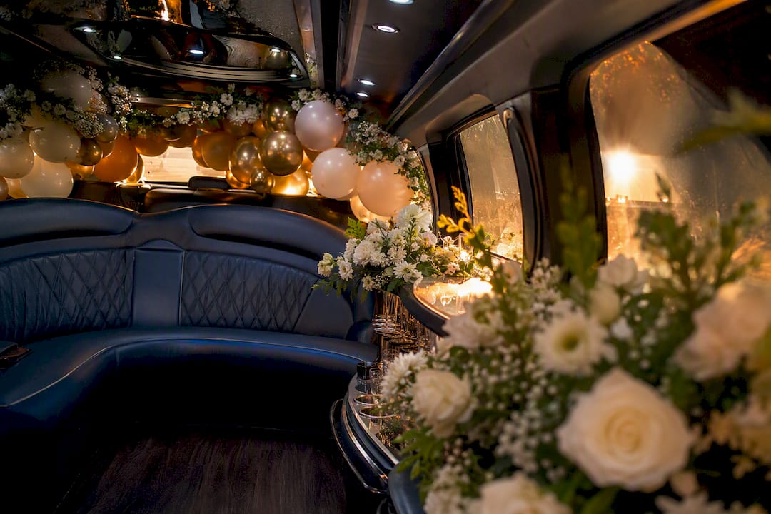 Floral and balloon wedding limo decor